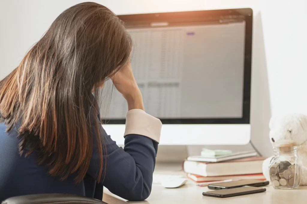 woman frustrated with computer design